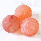 Himalayan salt bowl lamp with massage balls.