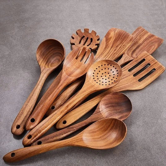 Handcrafted teak wood kitchen utensil set with a premium glass